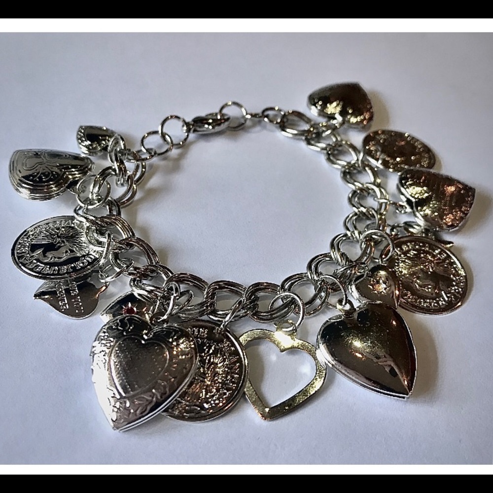 SOLD Silver charm bracket Made with Swarovski